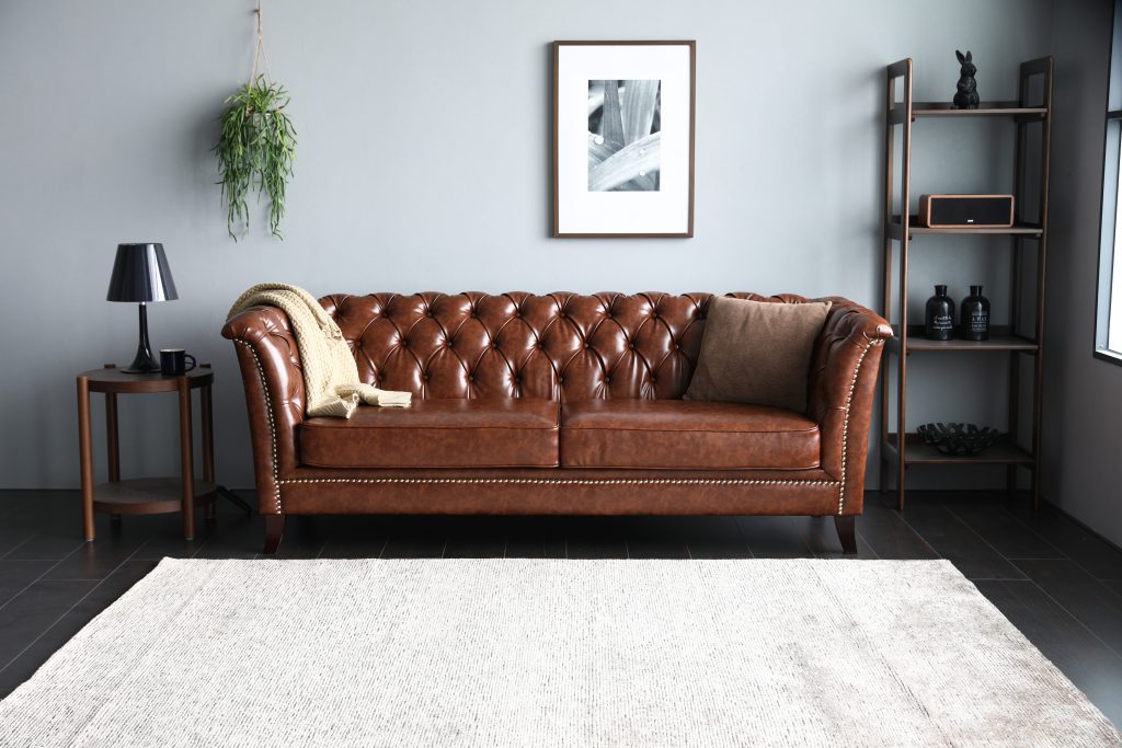 Neil Chesterfield Sofa in Dark Brown PU Leather.