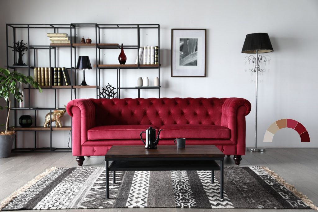 Red Hugo 3-Seater Sofa against cool grey backdrop.