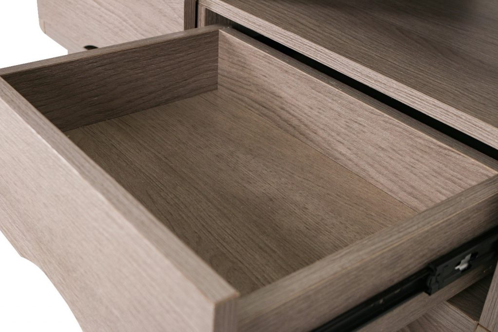 Dark wooden lacquer covers the drawers of the Danette Coffee Table.